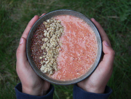 Fruity smoothie bowl with crunchy topping